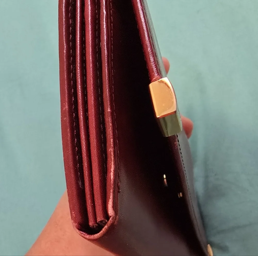 Elegant Burgundy Givenchy Leather Clutch